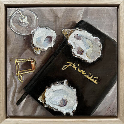 A still life table scape of oysters and wine