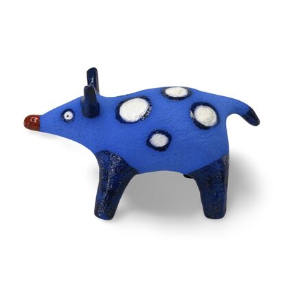 The Spotted Wombat features a playful, abstract rendition of a wombat, glazed in a striking deep blue with contrasting white circular spots and a red snout.