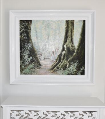 An ancient tree trunk dominates the foreground, while a girl in a white dress, collecting wild flowers, sits near the base of the tree. Another two girls are standing nearby. The scene is set in a mystical forest bathed in soft light and muted colours.