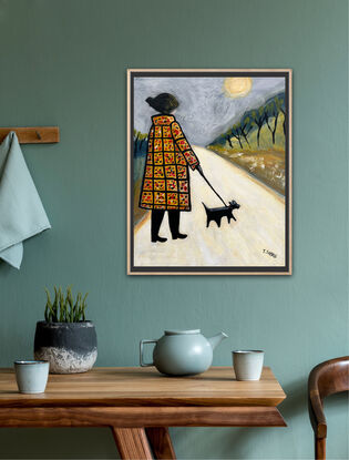 A naive style painting of a lady wearing a long ochre chequered patterned coat. She is walking a black dog on a lead along a long winding white path. There is foliage and skinny black trees on each side of the path and the sky is grey with a very pale ochre sun.