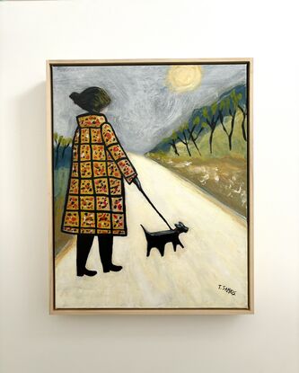 A naive style painting of a lady wearing a long ochre chequered patterned coat. She is walking a black dog on a lead along a long winding white path. There is foliage and skinny black trees on each side of the path and the sky is grey with a very pale ochre sun.