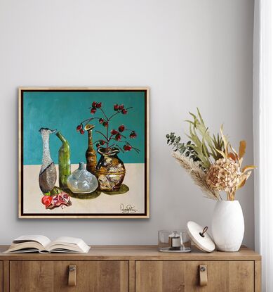 I am always inspired by simple things, a jug, a vase, simple food and flowers.  In this case the pomegranates and Gum Nuts add a juicy pop of colour.  This painting is textured and using a palette knife gives the vessels a fabulous antique feel.  A painterly style that would work well in a contemporary or classic setting. Framed in an oak float frame.