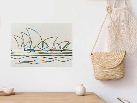 "Ripple" captures the essence of the Sydney Opera House in a beautifully abstract form, using flowing lines and vibrant colors to depict the iconic sails. This minimalist watercolor artwork emphasizes movement and fluidity, creating a sense of harmony and rhythm that mirrors the ebb and flow of Sydney Harbour. The piece offers a fresh perspective on a beloved architectural landmark, highlighting its dynamic structure in a simple yet captivating style.

