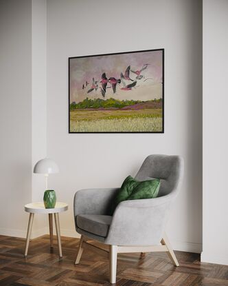 A flock of galahs flying across the landscape in the Central West NSW