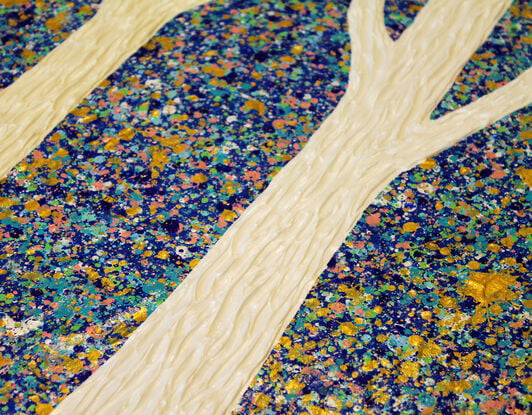 Textured white and beige trees on a deep blue textured background with metallic golds