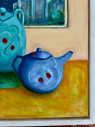 Three Quirky Teapots Against a pink wall and night sky cityscape