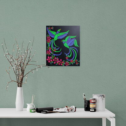 Vivid stylised green and purple birds with, pink flowers on a indigo background.