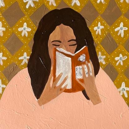 Blue background, woman reading book