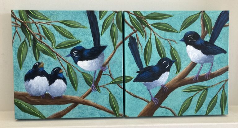 Two paintings of Willy Wagtails with one with a parent and young and the other with two birds as a couple. The artworks carry across the two canvases but can be purchased separately.