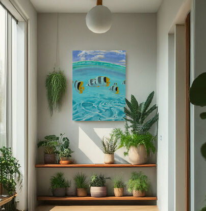 Underwater scene of Butterflyfish with light refracting through water