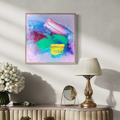 abstract painting framed in oak with pink and green