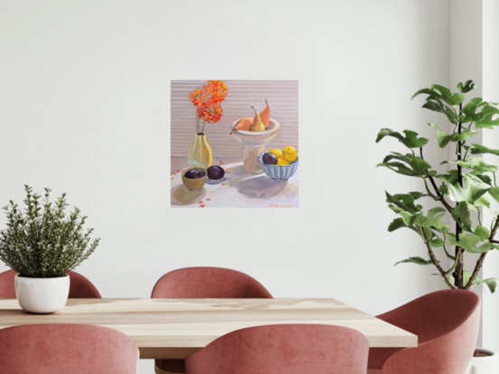 Crockery on a table with pears, passionfruit and lemons 