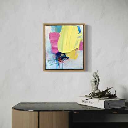 abstract painting framed in oak with pink and yellow