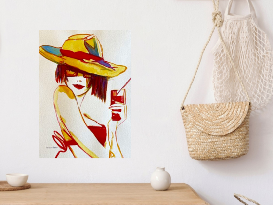 "Golden Glamour" captures the elegance of a woman in a large, vibrant sunhat and sunglasses, sipping a drink with poise. This watercolour painting uses bold reds, golds, and soft lines to evoke a sense of carefree sophistication and mystery. The figure’s posture and minimal facial features give the piece a timeless, chic quality that resonates with modern and retro vibes alike. This artwork invites viewers to bask in the simplicity and allure of a relaxed summer day.
