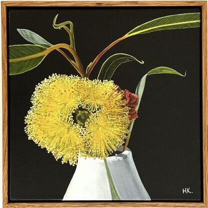 The painting features a bright yellow Eucalyptus Pressiana flower in full bloom, set against a dark background. Its vibrant stamens and green-grey leaves with bug marks are meticulously detailed. The flower rests in a simple white vase, creating a striking contrast with the moody backdrop.