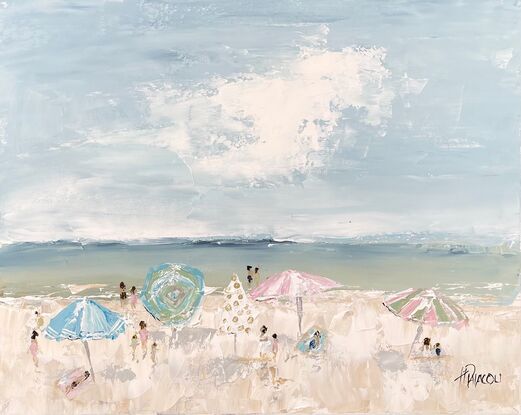 Beach umbrella painting on a sunny summers day.