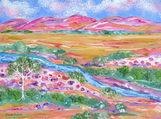 Colourful hills, sky, river and trees.