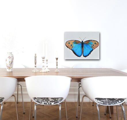 Palette knife oil painting of a Blue Morpho Butterfly on an off white background. This colourful insect is ready to hang and arrives with a certificate of authenticity.