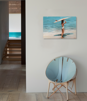 Surfer girl carrying  surfboard 