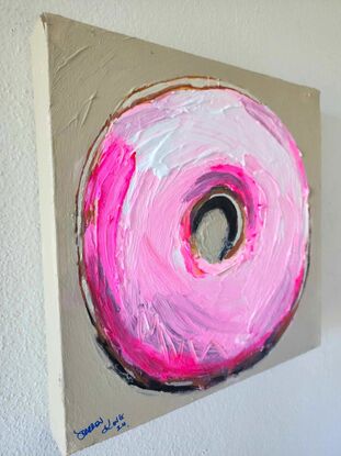 A textural loose pink donut painting