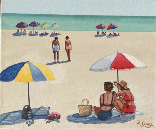 People sitting under beach umbrellas on the beach in the sixties. Ocean in background. 