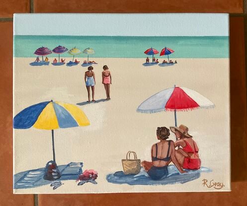 People sitting under beach umbrellas on the beach in the sixties. Ocean in background. 