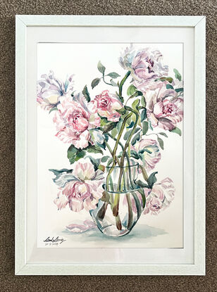 Elegant roses in transparent vase