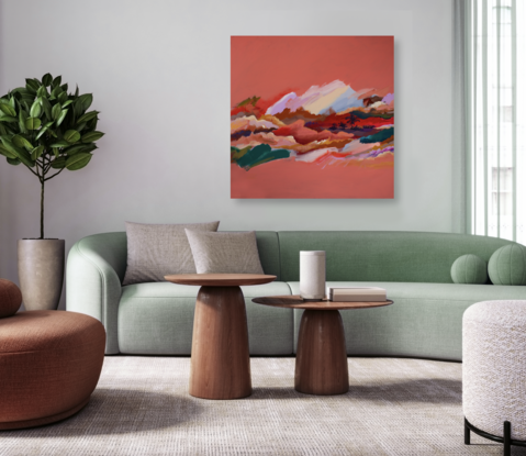 An abstracted landscape view is seen through a scattering of abstracted clouds in shades of white, red, pink, emeralds as well as textured ochre, peach and pink., and some palm tree silhouettes. Surrounded by a light watermelon background.