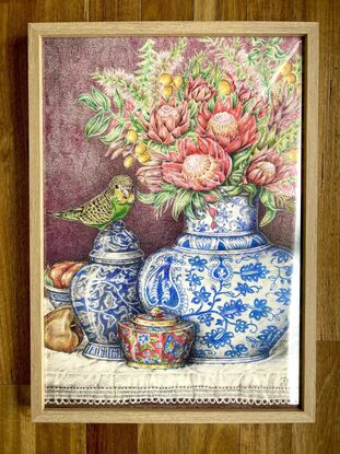 Three ginger jars
 A bird budgie
Australian native flowers on a table with tablecloth