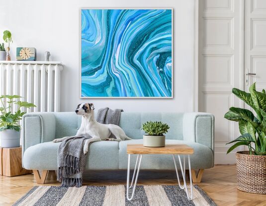 In this artwork, different shades of blue, green, and aqua blend with a touch of white to form abstract and flowing/waving lines across the canvas. These colors feel uplifting and optimistic.