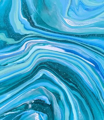 In this artwork, different shades of blue, green, and aqua blend with a touch of white to form abstract and flowing/waving lines across the canvas. These colors feel uplifting and optimistic.