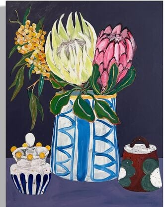 Australia Native flower in the blue and white vase. Two tea jars on the side.