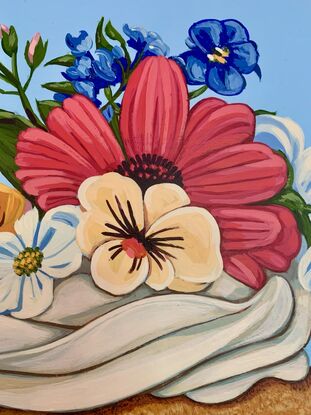 One of four whimsical cupcake paintings, adorned with flowers on circular board, because "happiness is only a cupcake away!"