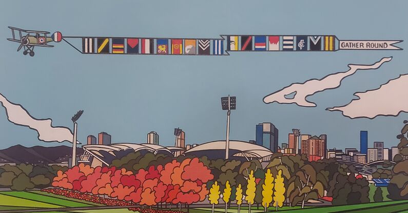 A plane flying above Adelaide Oval with the AFL colours.