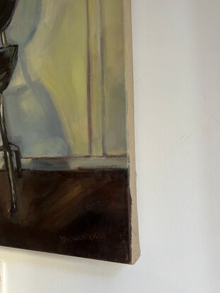 A painting of a chair in the studio.