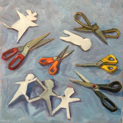 This is a painting of pairs of scissors on a blue background and paper cut out dolls.