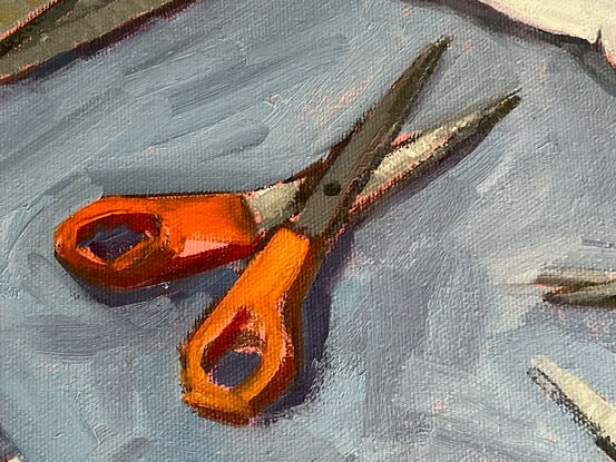 This is a painting of pairs of scissors on a blue background and paper cut out dolls.