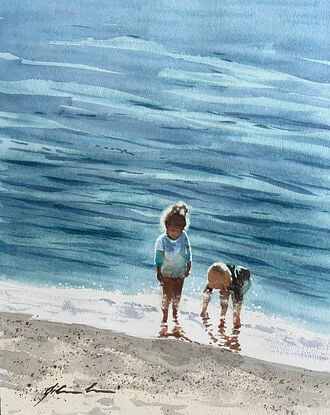 An beach scene, sparkling water and and 2 children playing by the water's edge.