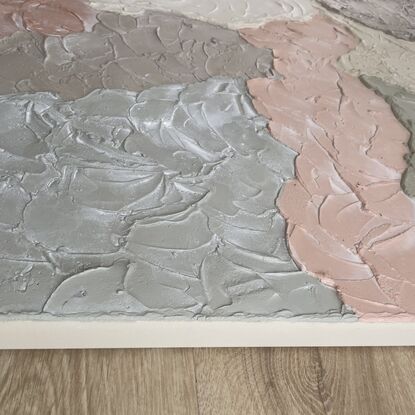 Thick clouds of lightweight plaster overlap each other to created a cloud-like affect. Each cloud is in a shade of beige, terracotta, sage and olive.