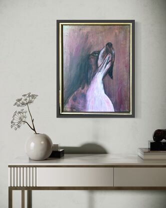 Painting of a French Brittany dog, looking upwards, in crimson and bronze tones. 