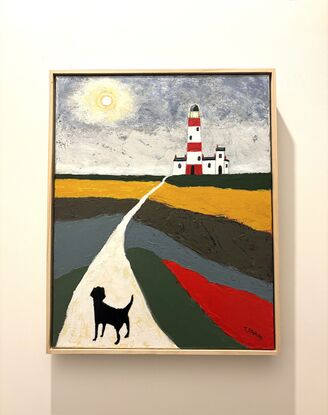 A naive style palette knife painting showing a countryside scene with colourful fields of green, red, blue and ochre, beside a long white yellow path, where a black dog is walking with its back view to the viewer, the path leads to a red and white lighthouse in the far distance. The sky is a mixture of greys with a full moon in the sky. 