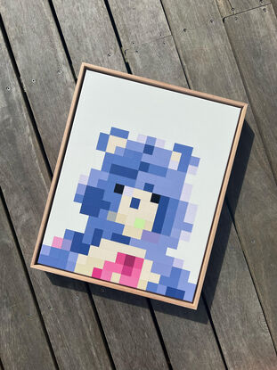 Blue and purple pixelated teddy bear