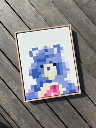 Blue and purple pixelated teddy bear