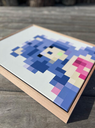 Blue and purple pixelated teddy bear