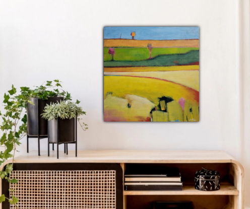 Small yellow landscape painting of fields 