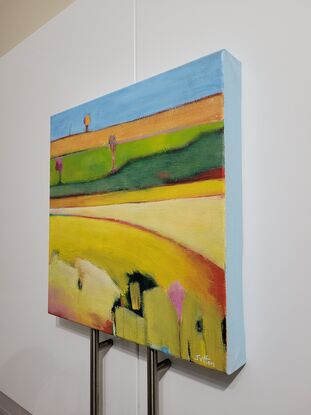 Small yellow landscape painting of fields 