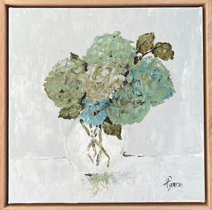 Still Life green hydrangea bunch  in natural timber frame.