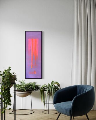 A vertical acrylic artwork featuring a soft lilac background with a vibrant central stripe of blended pink, orange, and gold hues. The colors appear to cascade down the canvas in organic, textured strokes, created by dragging paint with a flat surface. The contrast between the calm lilac and the energetic colors evokes a sense of balance and movement.