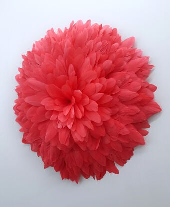 coral red feather wall hanging juju hat