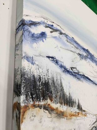 A large abstract painting of the Australian alpine region in  earth colours, white and blue